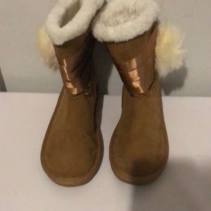 Tan size 8 boots from Justice store